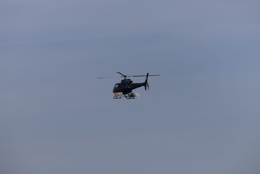 Helicopter in air by Spirit River Airport