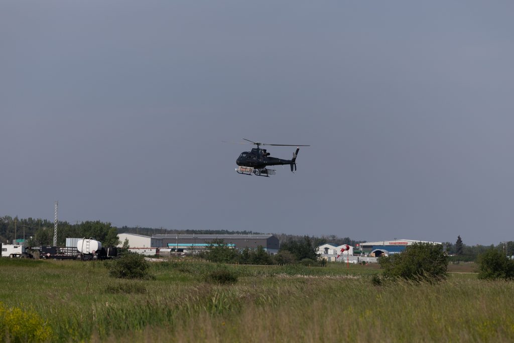 Helicopter landing at Spirit River airport